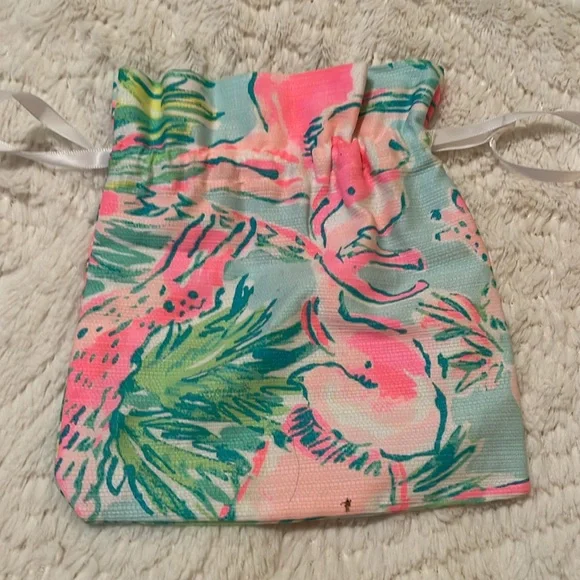 Closing Closet- 5 for $25 on select items. 
Lilly Pullitzer bracelet with bag. - Picture 3 of 6